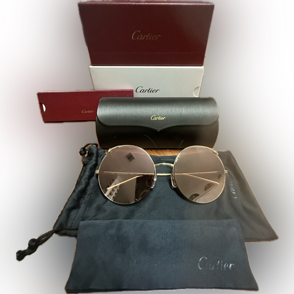 CARTIER CT0149S 
Gold Round Sunglasses all Inclusive!